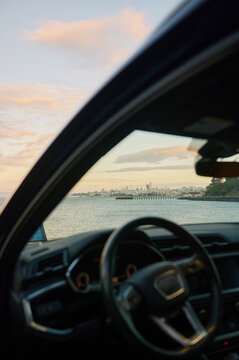 Scenic View of City Skyline From Inside a Parked Car