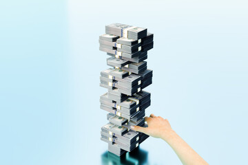 Precarious Wealth: A Jenga Tower of Dollar Bundles Teetering on Risk