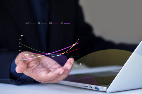 Business analytics growth performance chart, digital marketing metrics visualization on businessman hand and laptop, Digital marketing ROI, CTR, and CRO growth data visualization, business performance