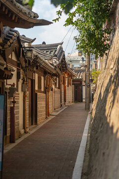 Narrow Street in Traditional Hanok Village During Sunny Day, Seoul
