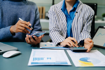 Team work process. Photo young business crew working with new startup project. Project managers...