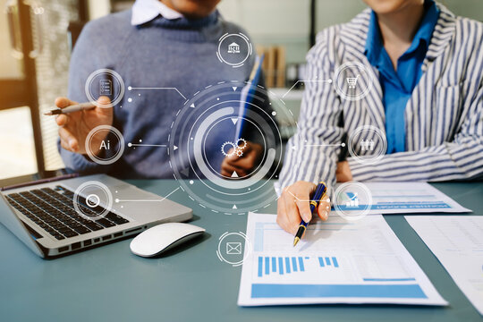 Working team meeting concept, business using laptop and smart phone and digital tablet computer with digital marketing media  in virtual icon network diagram office