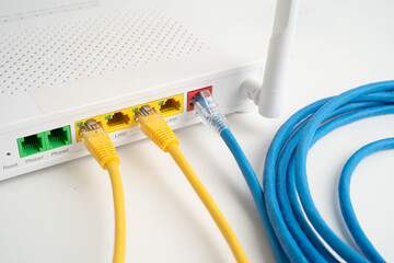 Ethernet cable with wireless router connect to internet service provider network.