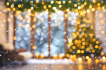 Defocused bokeh and blur christmas tree and lights glitter sparkle background.