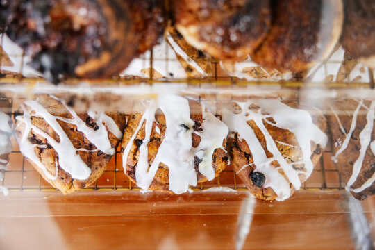 Closeup of pastries with icing drizzle
