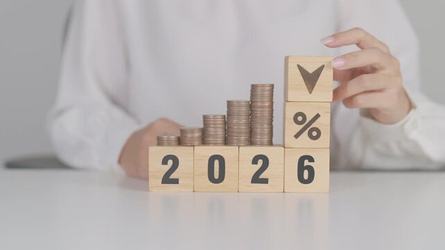 2026 New year with percentage change to UP and Down arrow with coin stack. Interest rate, GDP, stocks market, financial, deflation and Inflation, mortgage, debt, Loan and Economic Recession