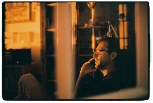 a man is talking on the phone