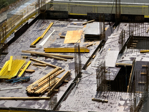 Formwork, Steel Rebars, and Building Materials on Slab