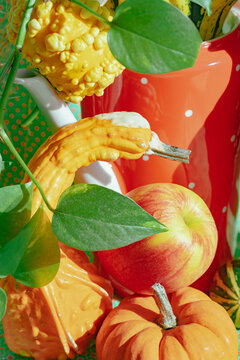 Gourds and fresh apples in autumn display