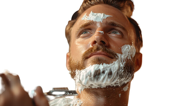 Handsome man shaving his beard with lather and a straight razor for a smooth look, demonstrating grooming and self-care, a modern lifestyle routine isolated on white background