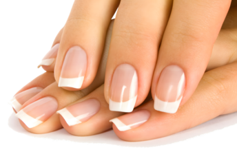 Woman receiving a french manicure treatment at a spa, with a close-up on the healthy fingernails and hands being cared for with moisturizing cream and cosmetics