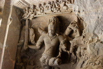 Rock-cut sculpture of the Hindu God Shiva, carved into the Elephanta Caves