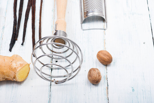 egg beater metal spiral and dessert ingredients - Powered by Adobe