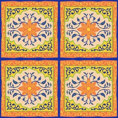 Ornate tile pattern featuring a central orange flower with elongated petals, surrounded by blue leafy tendrils. The background is a light beige, bordered by intricate yellow and green designs.