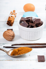 muffin baking ingredients on white wooden table
