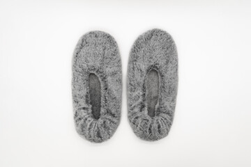Soft Gray Fuzzy Slippers, Cozy Indoor Footwear, Warm Plush Fabric, Comfortable Home Shoes, Minimal White Background
