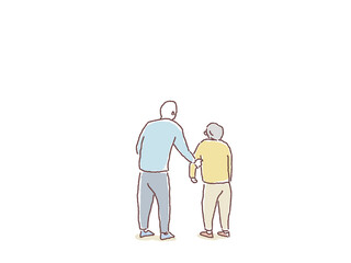 支え合う高齢夫婦の後ろ姿