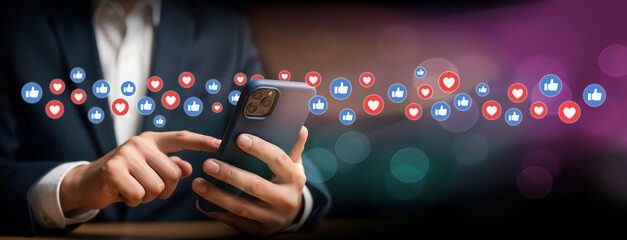 Flowing Social Connections Through Mobile Interaction, Man uses phone with wave of likes and hearts in motion