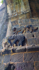 stone carving at entrance of the janjira fort in murud in maharashtra in india.
