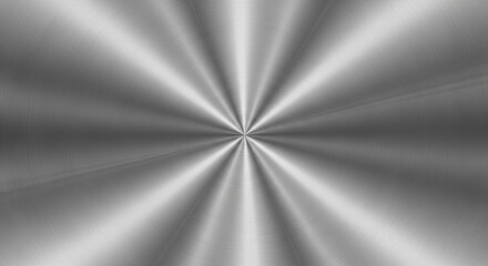 Shiny metal surface with a radial pattern emanating from the center.