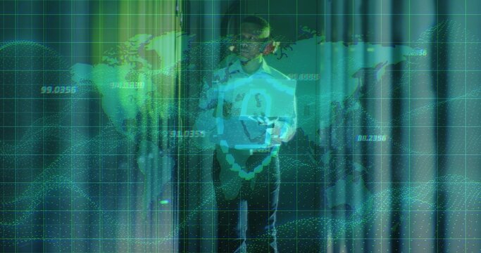 Presenting mid adult man interacting with holographic world map projection in tech hall, grid data