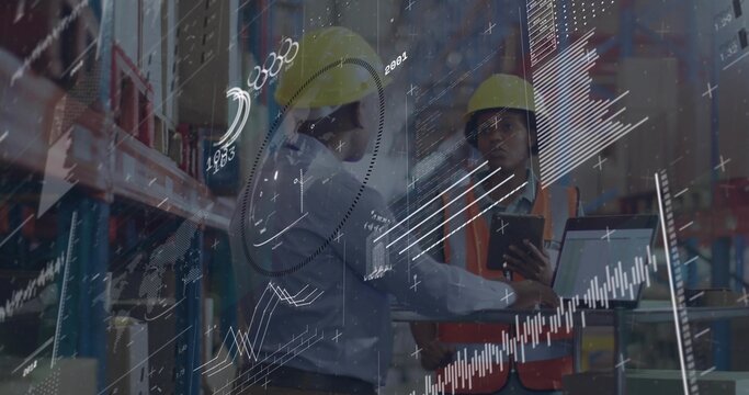 Analyzing staff wearing safety gear interpreting data overlays on laptop and tablet in warehouse - Powered by Adobe