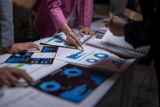 Business people analyzing financial data for strategy development