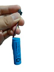 Hand Holding a Rechargeable Lithium Ion Battery