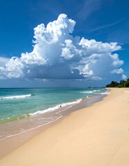 A scenic coastal view showcasing a sandy beach with turquoise waters, under a vibrant blue sky dotted by fluffy, white clouds