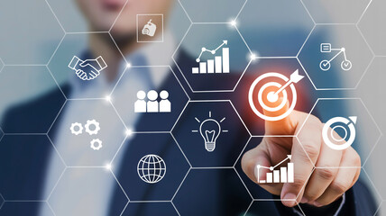 hand pushing a button on a touch screen