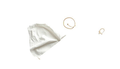 White fabric bag with drawstrings, against a dark background