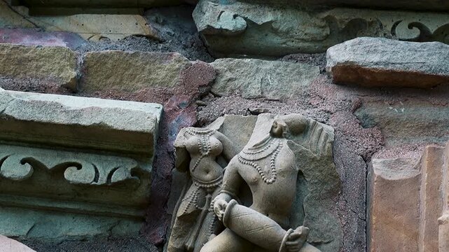 Famous Stone Carving Sculptures Of Khajuraho In India, Erotic educational sculptures of temples of Khajuraho, Madhya Pradesh. Beautiful Stone Carvings In Khajuraho Temple, UNESCO World Heritage Site 