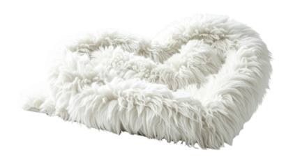 Fluffy, white heart-shaped cushion, soft & inviting on black