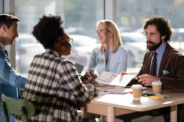 Diverse business people discussing during office meeting