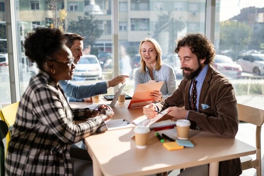Business colleagues collaborating during a meeting in the office