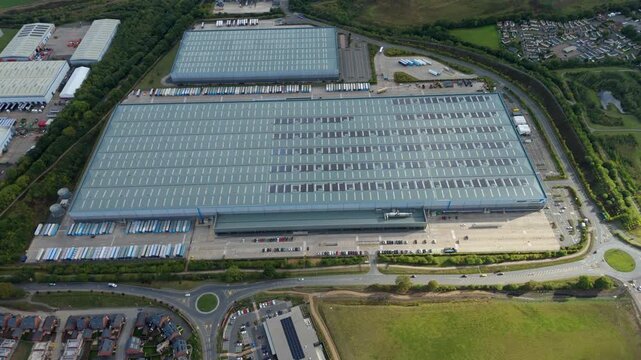 Drone footage of factory distribution centres and freight trailers in Coalville England import export logistics operations