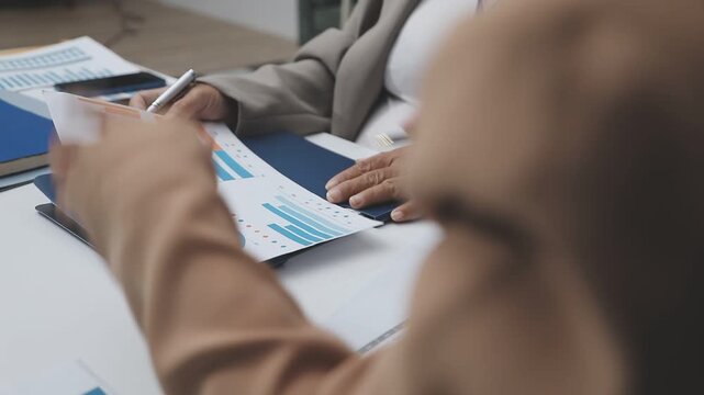 Finances Saving Economy concept. Female accountant or banker use calculator.