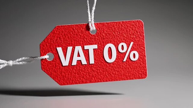Crimson paper tag featuring the words zero percent VAT gently swaying. Represents tax exemptions, exclusive deals, discounts, and value added taxes