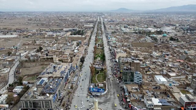 Jalalabad Drone Aerial of city center, Nangarhar, Afghanistan. View of City Street Traffic and Downtown Buildings