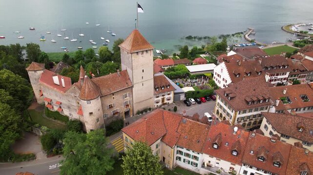Switzerlan tourism, canton Fribourg . Charming medieval town Murten (Morat) in scenic lake Murtensee. aerial drone view with castle.  Idyllic swiss villages