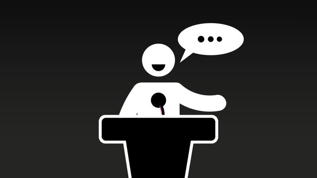 A speaker stands behind a podium delivering a public address, demonstrating confidence, leadership, and the power of voice to inspire and inform a listening crowd