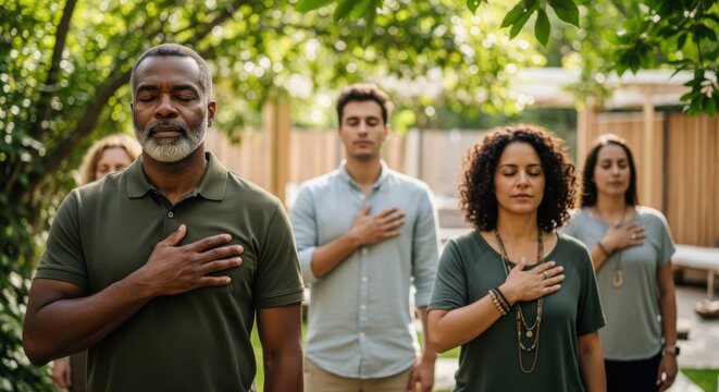 Group practice of mindfulness meditation in a serene outdoor setting during daytime