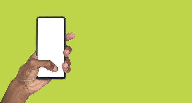 Hand displaying empty smartphone for mobile marketing, product launch visuals or creative