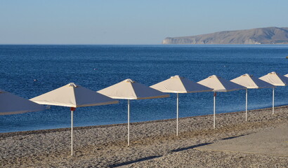 beach with umbrellas © Sergei