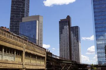 Cityscape with Modern Skyscrapers and Vintage Train Tracks