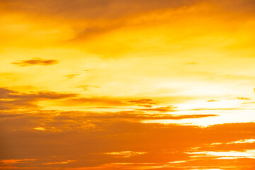 Enjoy panoramic views of the skyline . Sunset in the evening sky with colorful clouds and beautiful cloud patterns Amidst the soft golden light	