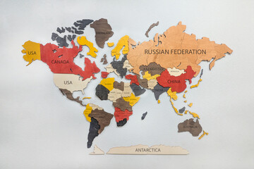 colorful world map highlighting countries with distinct colors. Major countries like USA, China, and Russia are labeled clearly. The map is designed with a textured appearance © Александра Замулина