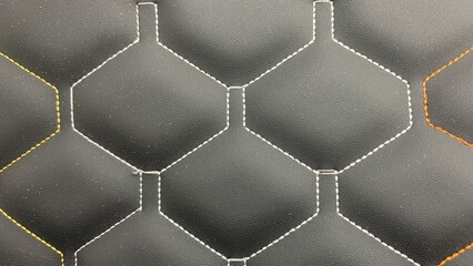 Beautiful thread stitching on the black leather.