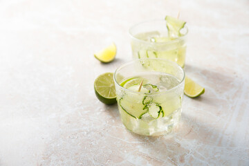 Refreshing drink with lime and cucumber	
