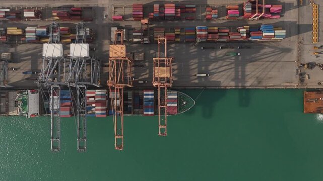 4k Aerial view from a container drone. Container ships in export-import and logistics business Transporting goods to large ports Worldwide shipping and logistics business International business abroad